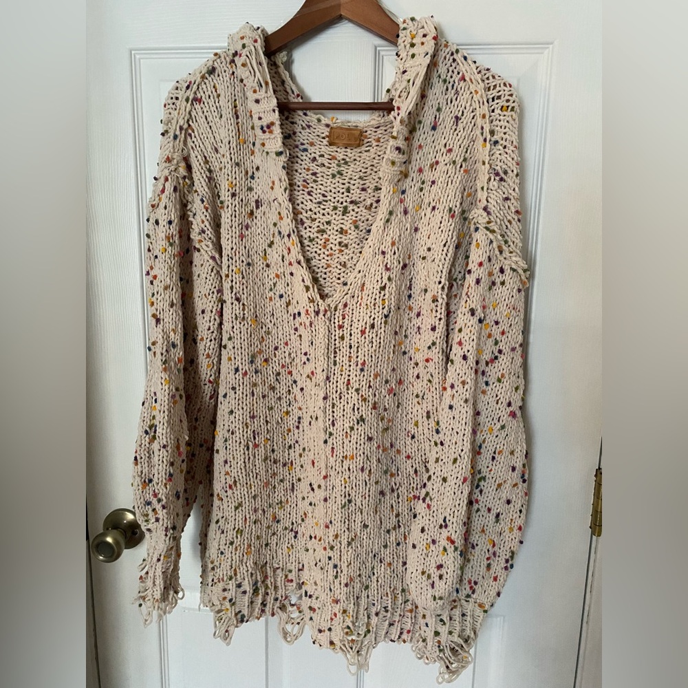 Cozy, distressed hoodie sweater